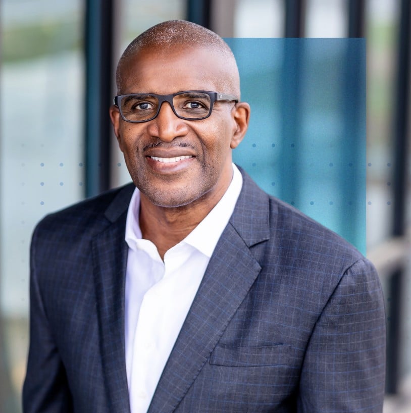 Kevin Brown, Dell Technologies' EVP of Global Operations, wears a blue suit jacket and white shirt