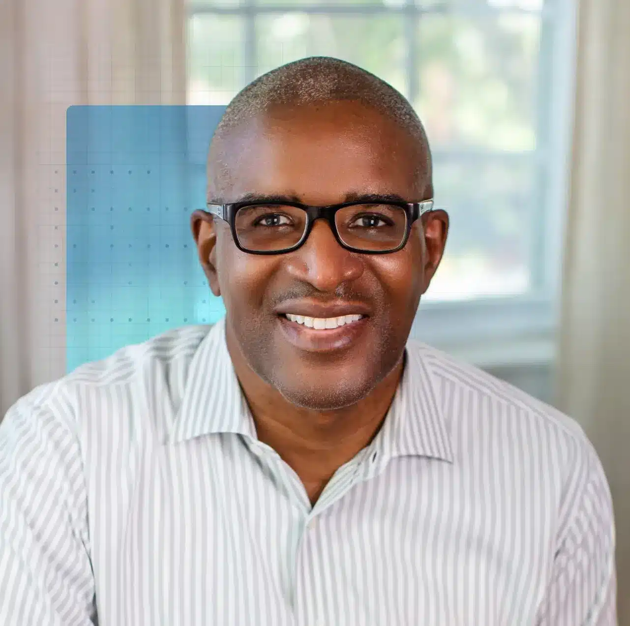 Kevin Brown, Dell Technologies' EVP of Global Operations, smiles with glasses and a button down shirt